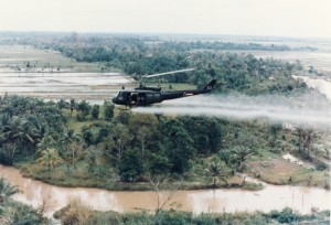 US Huey helicopter spraying Agent Orange